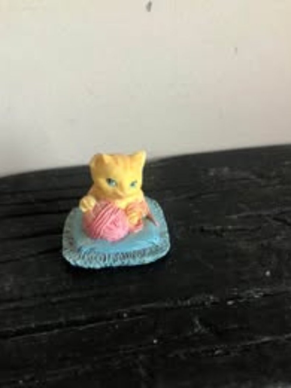 Mini kitty with a ball of yarn